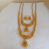 Untitled design (93) Traditional Gold-Plated Bridal Long Haram Necklace Set with Ruby, Green Stones & Pearl Drops