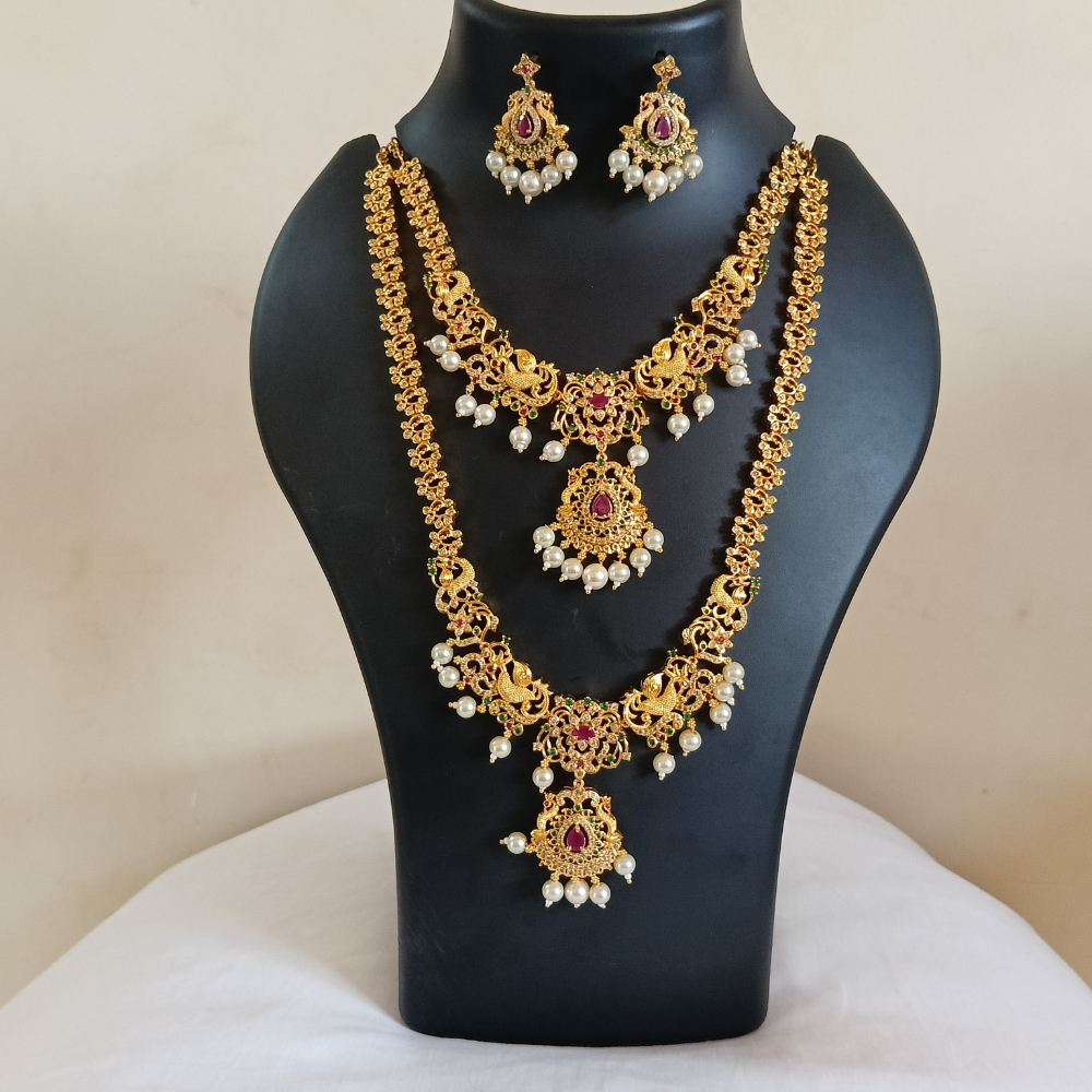 Untitled design (94) Traditional Gold-Plated Bridal Long Haram Necklace Set with Ruby, Green Stones & Pearl Drops